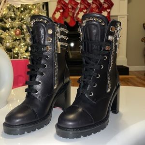 Worn once. CL black combat boot with spikes